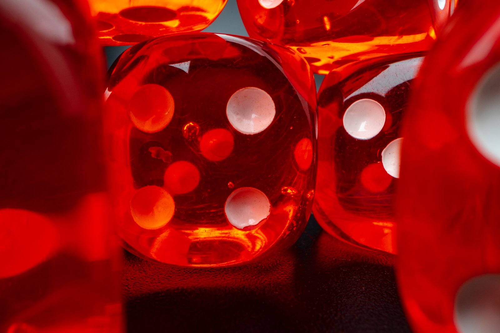 Casino dice on a dark surface